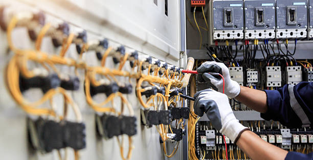Professional Electrician technician working in Edna, TX